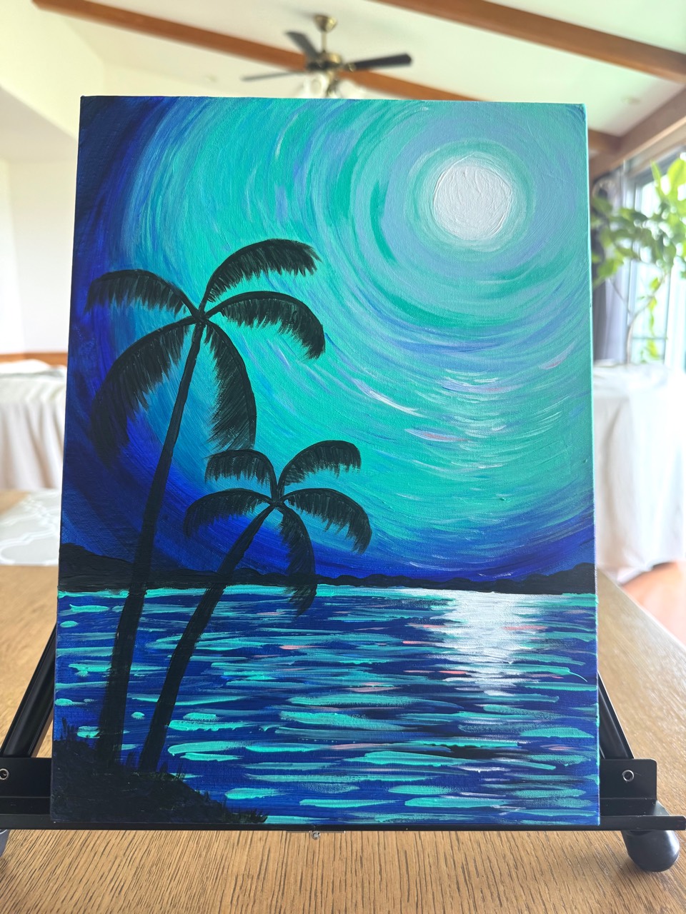 Emerald Moon painting with palm silhouettes and an emerald moonlit ocean