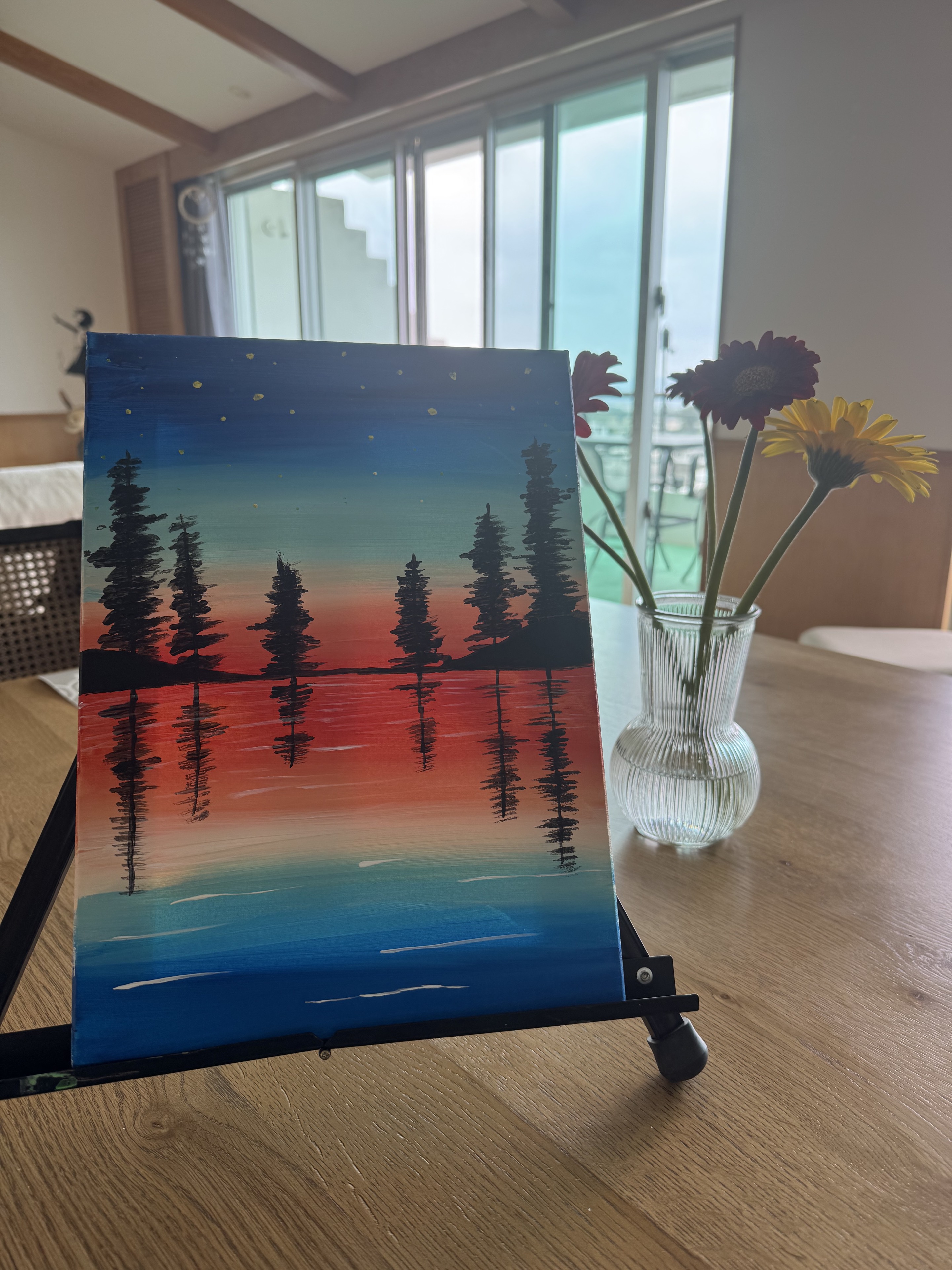 Finnish Night painting with pine silhouettes and reflections at sunset