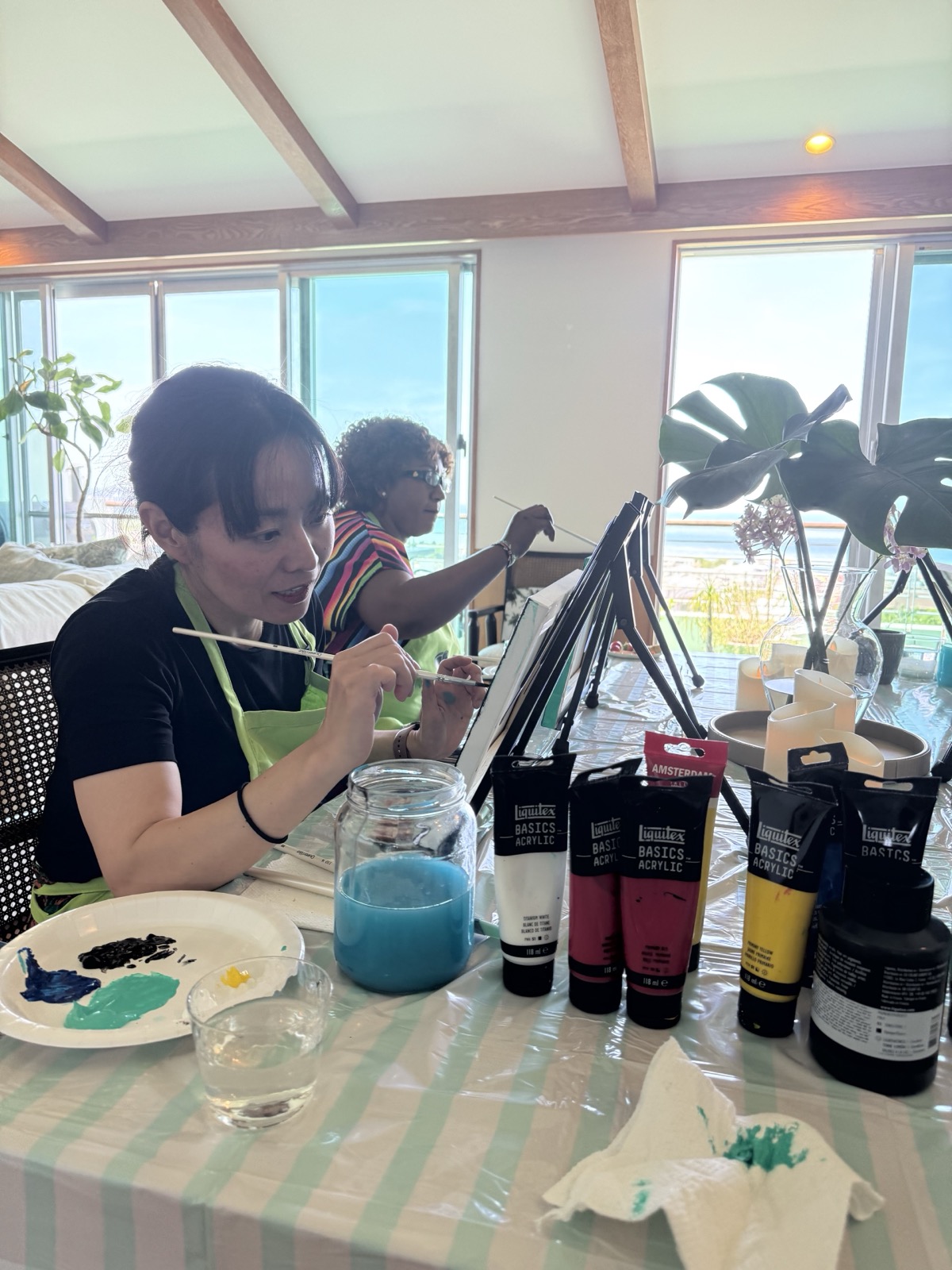 Pinto Beetle guests focused on painting during class