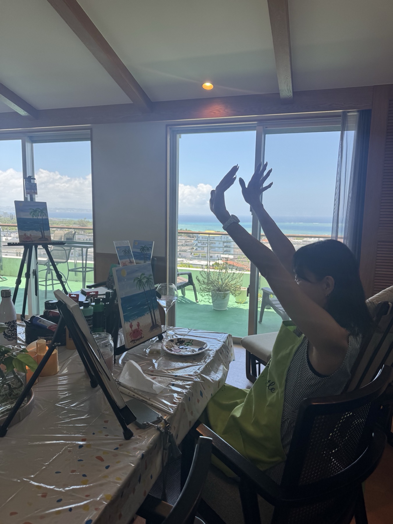 Pinto Beetle guest celebrating during a Palm tree and Little Crab painting class