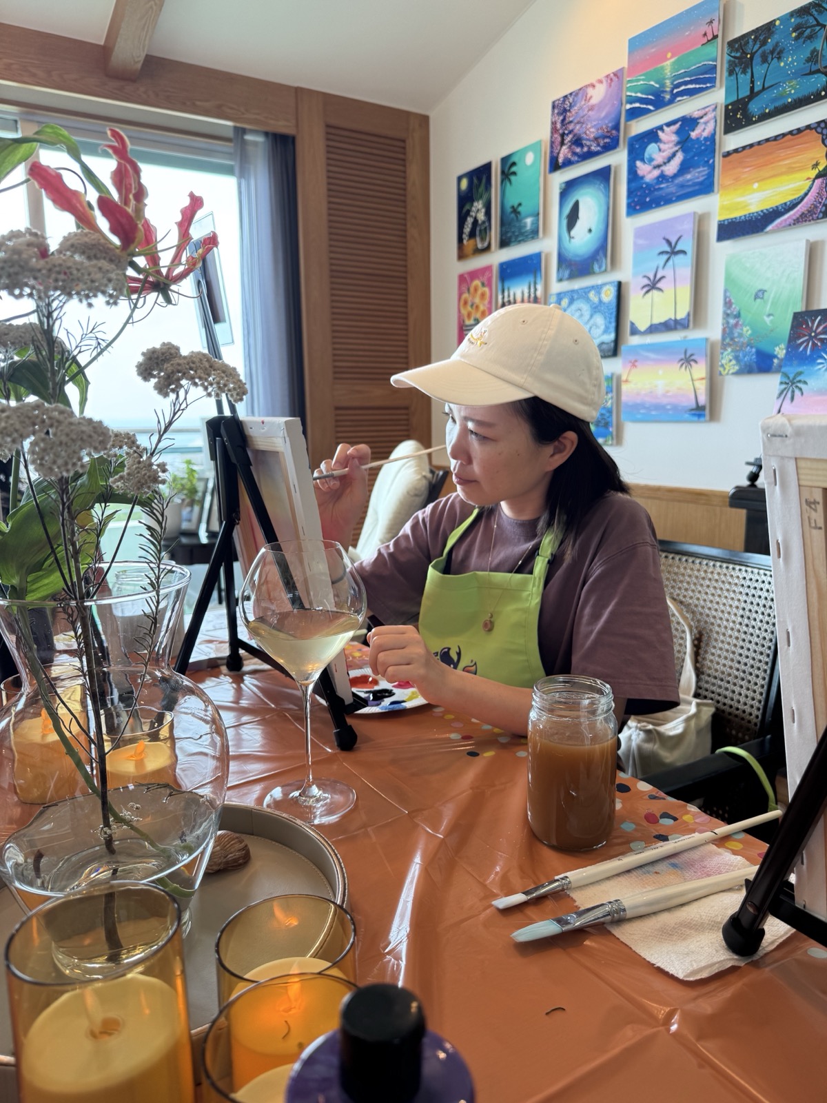 Guest enjoying a relaxed painting moment at Pinto Beetle