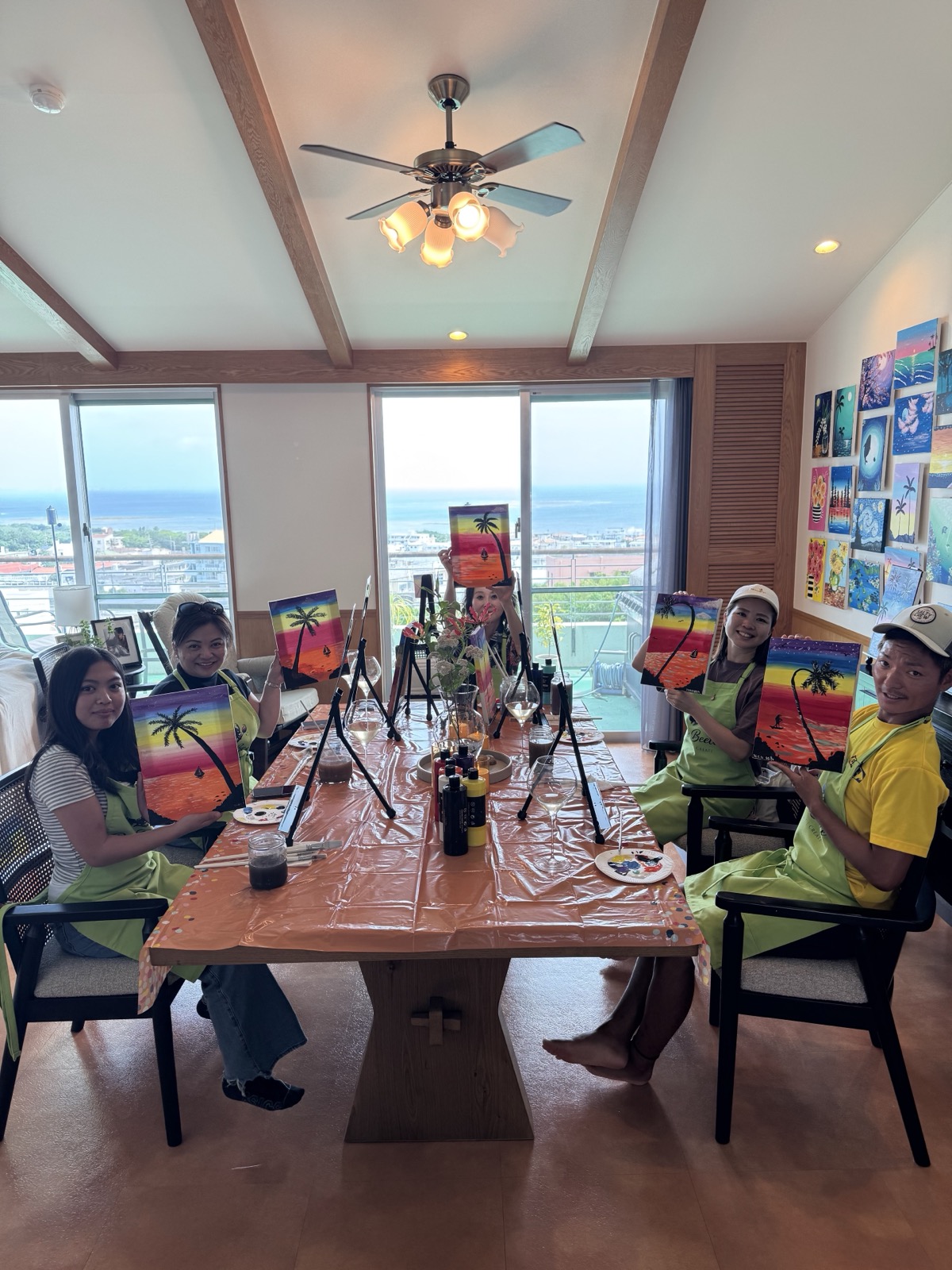 Pinto Beetle sunset painting class gathered around the studio table