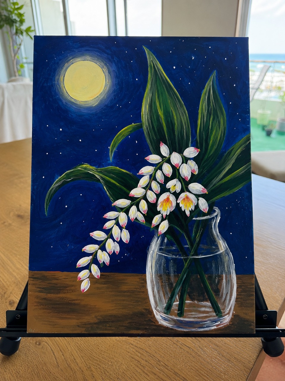 Finished Moonlit Getto painting on an easel